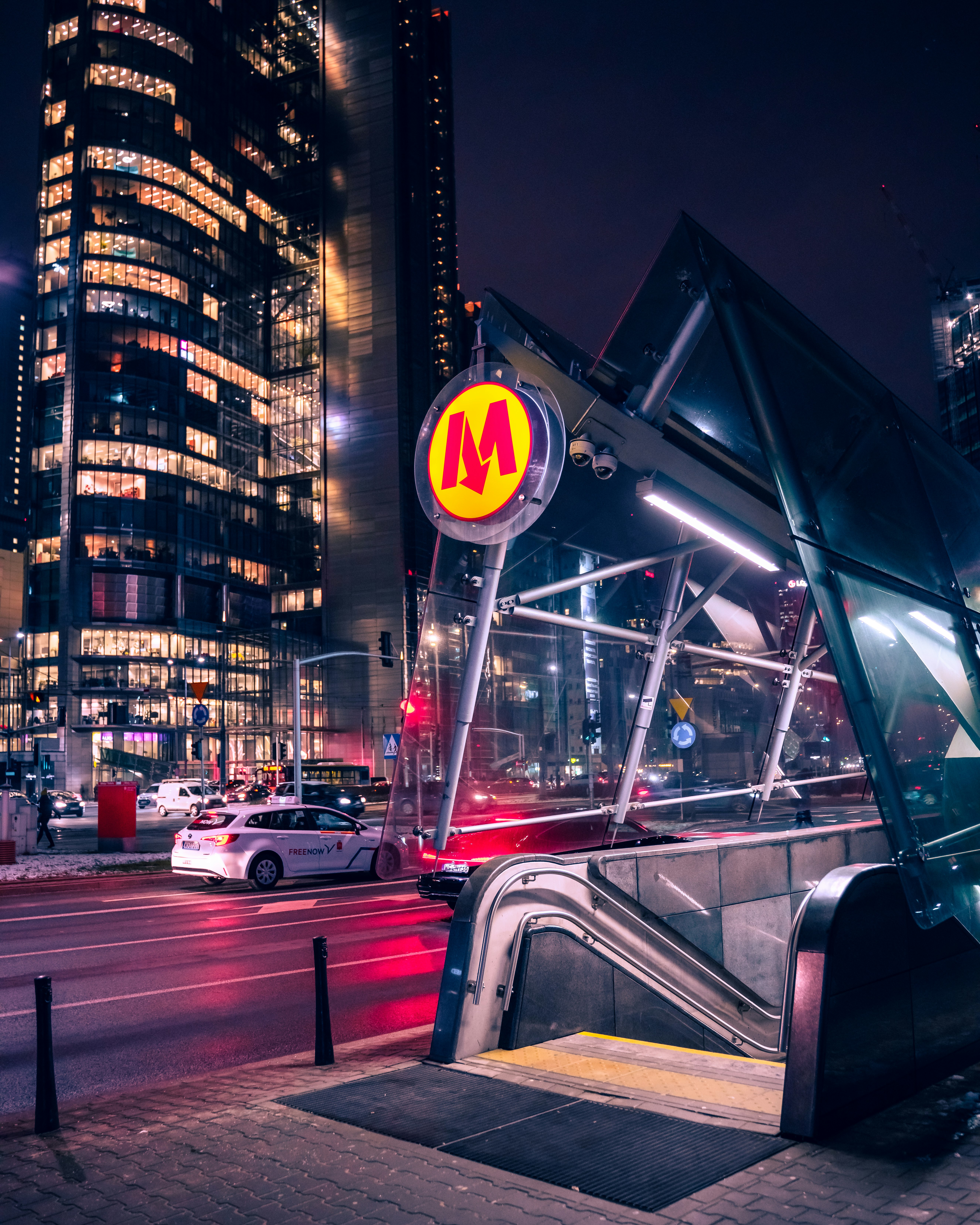 cars parked on side of the road during night time